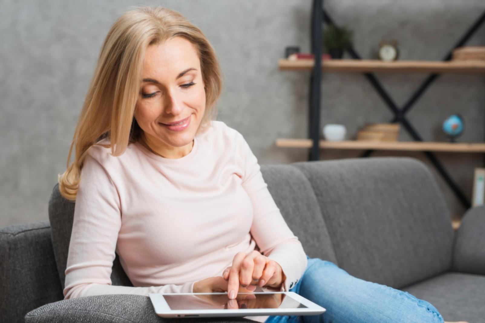 Team member reviewing financial materials with community member