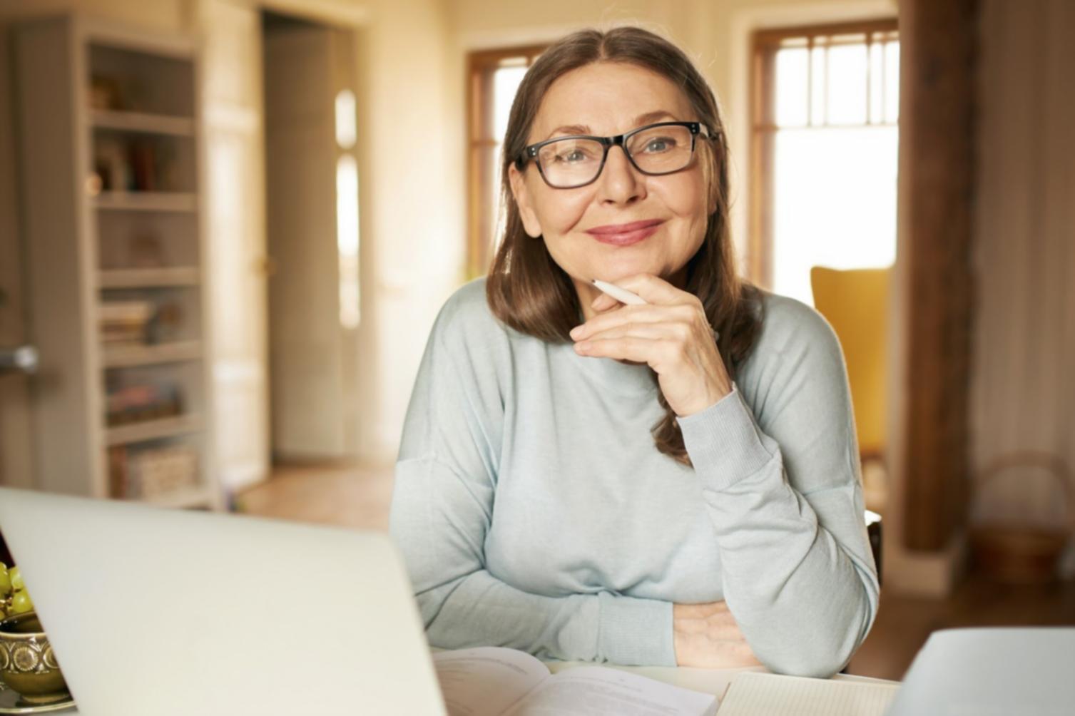 Financial planning workspace showing organized documents and calculator